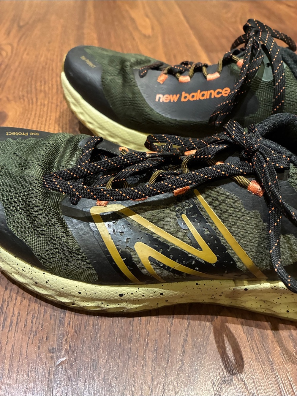 New Balance Olive Green and Black Trail Sneakers with Orange Accents - Picture 4 of 9